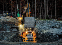 construction equipment at sunrise