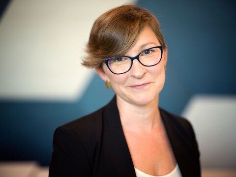 the headshot of a woman