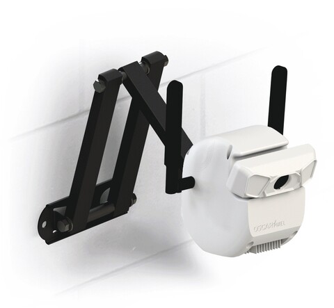 Intuitive Oscar Pixel camera system with a black mounting system on a while tile wall.