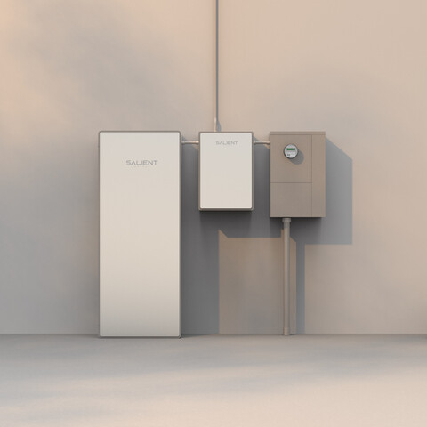 Gray, rectangular Salient Energy zinc-iron battery system mounted on a wall, connected to the utility box via aluminum conduit.