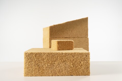 Different thicknesses of TimberBatt insulation stacked with the top one cut on an angle