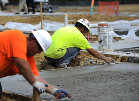 smoothing concrete at a building site